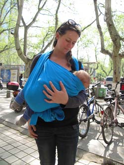 nursing in a baby wrap newborn LLA